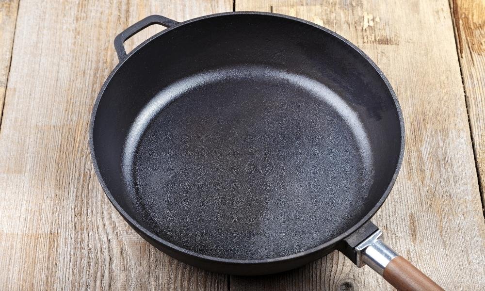 cast iron vs pure iron cookware
