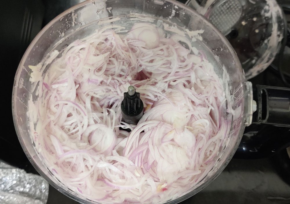 food processor in Indian Kitchen for slicing onion