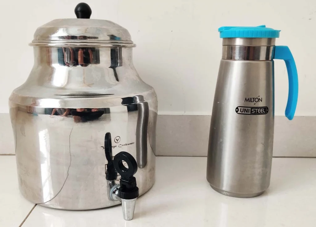 plastic free kitchen- water stored in stainless steel container and bottles